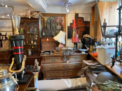 Collectables and lighting in antique shop Stow on the wold